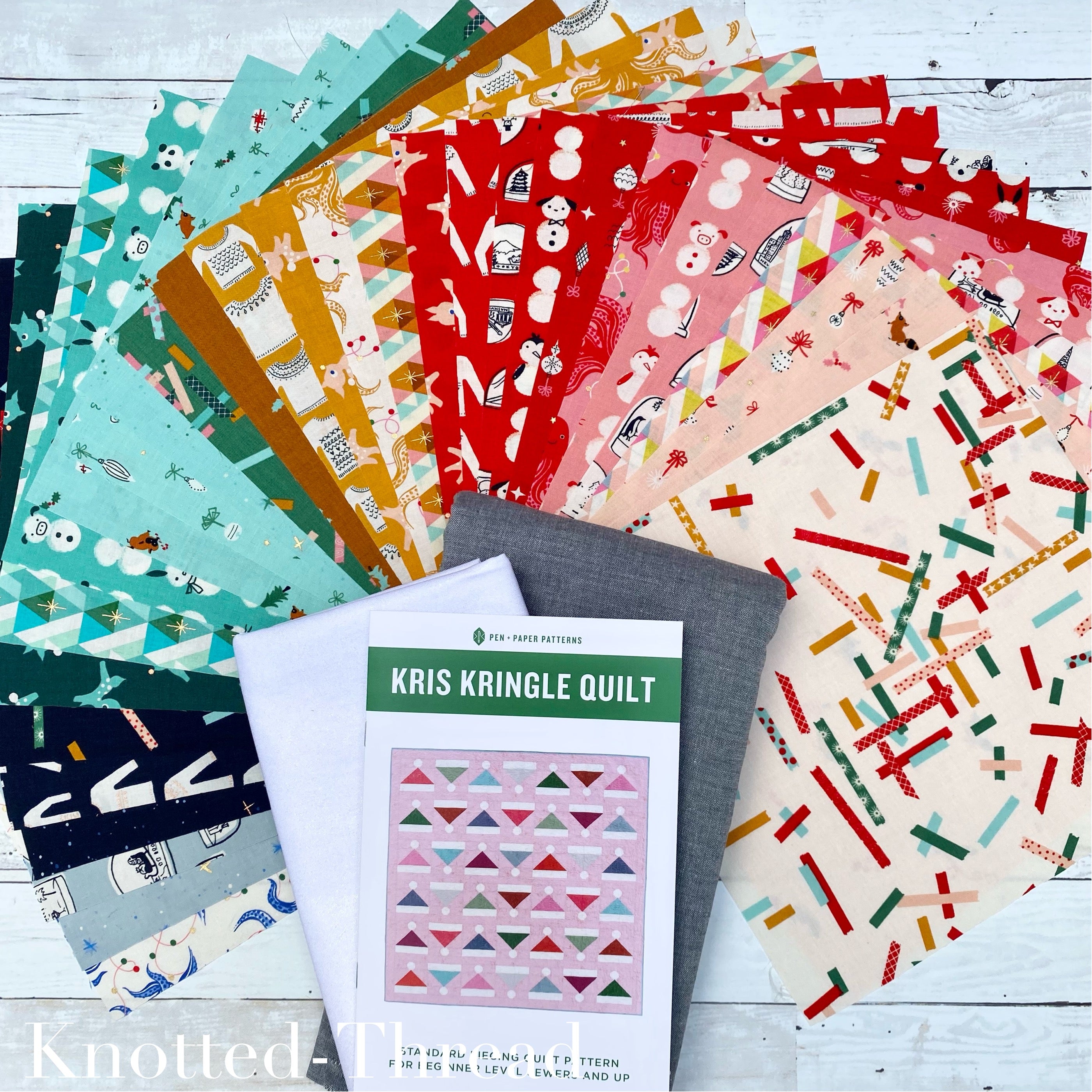 Kris Kringle Quilt Kit - Pattern popular by Pen and Paper Paper - made with Jolly Darlings - 100% Cotton - Finished size 61